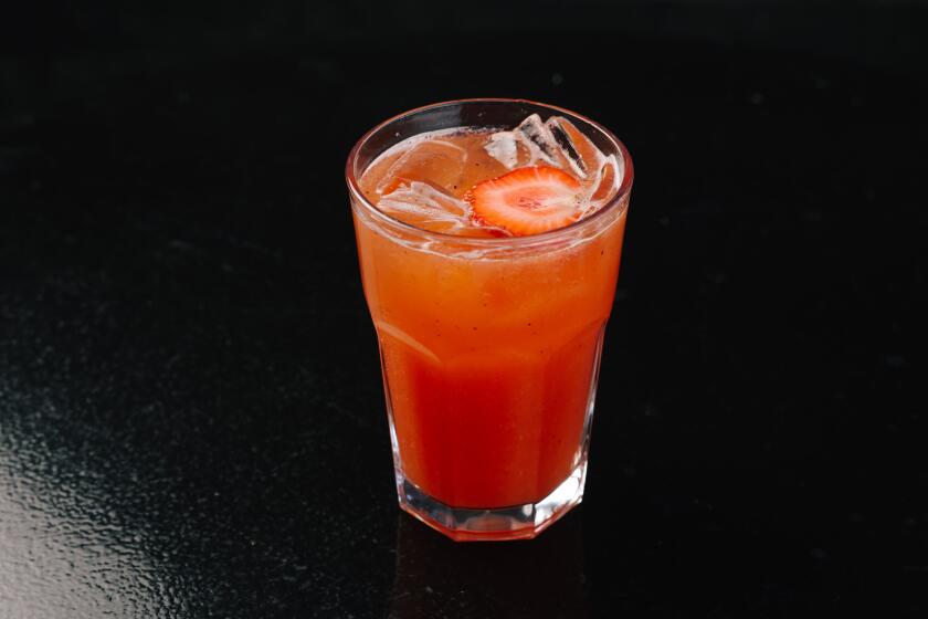 Los Angeles, CA - November 27: A "Red Alert" non-alcoholic cocktail is seen at Trejo's Hollywood Cantina on Monday, Nov. 27, 2023 in Los Angeles, CA. This cocktail is made with bell pepper, strawberries, lime juice, ancho simple syrup and strawberries for garnish. (Dania Maxwell / Los Angeles Times)